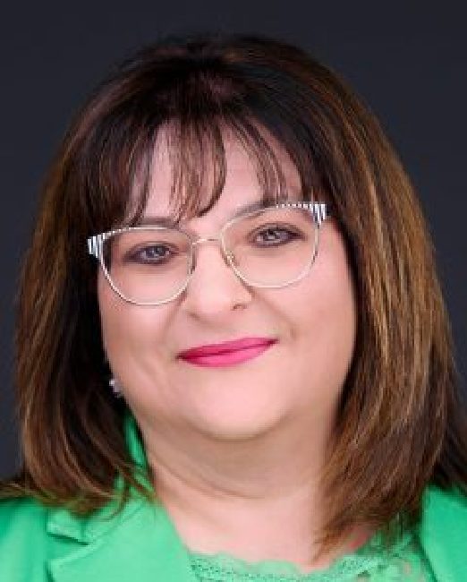 Carrie Nolan-Robson (she/her) Executive Director